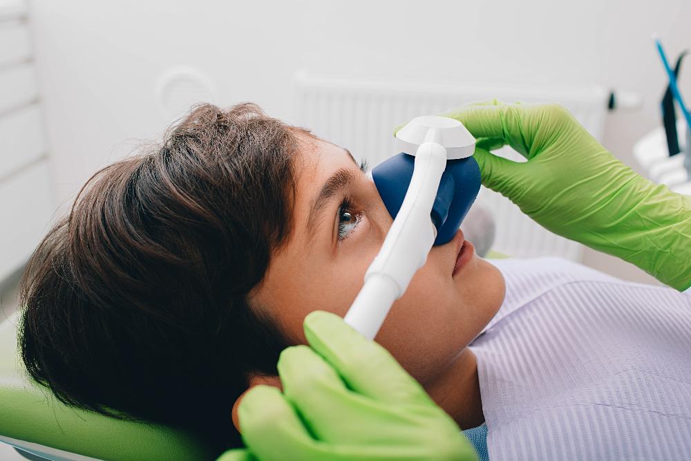 boy with sedation dentistry device | dentist in spring brance