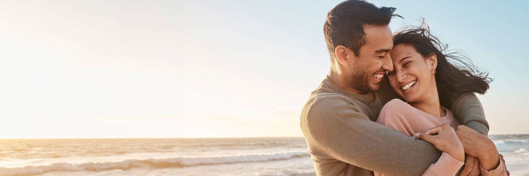 implant restoration spring branch | couple at beach