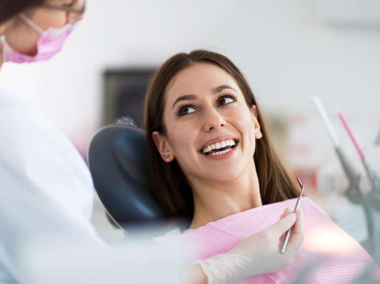 spring branch dentist | woman smiling at dentist