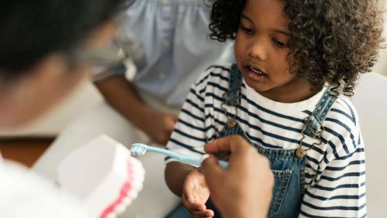 pediatric dentist houston | kid at dentist