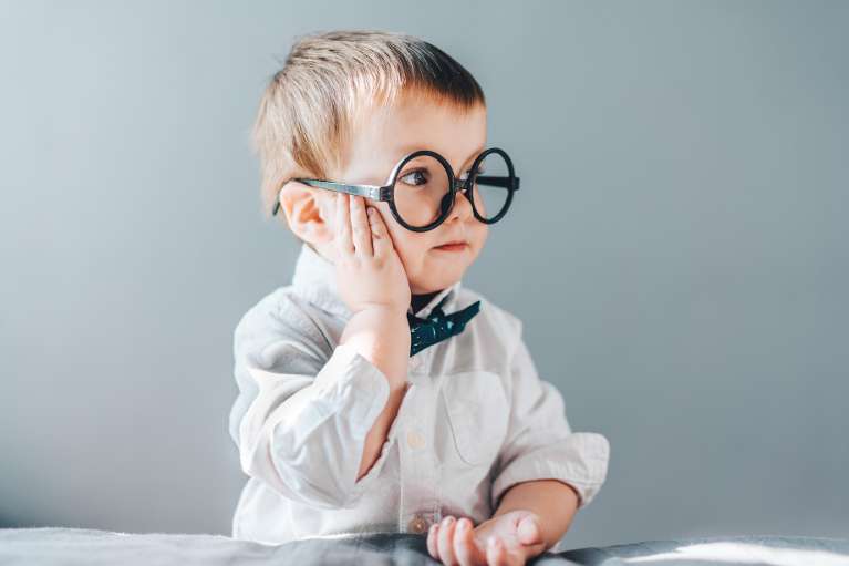 spring branch pediatric dentist | little boy with glasses