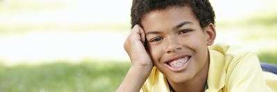 Boy outside with orthodontic braces in Spring Branch, TX