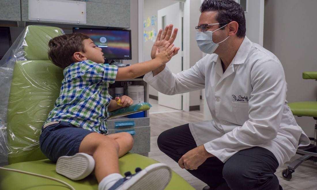 family dental care spring branch | pediatric dentist with patient