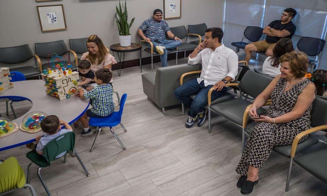 family dental care spring branch | patients in waiting room at echeverri dental center